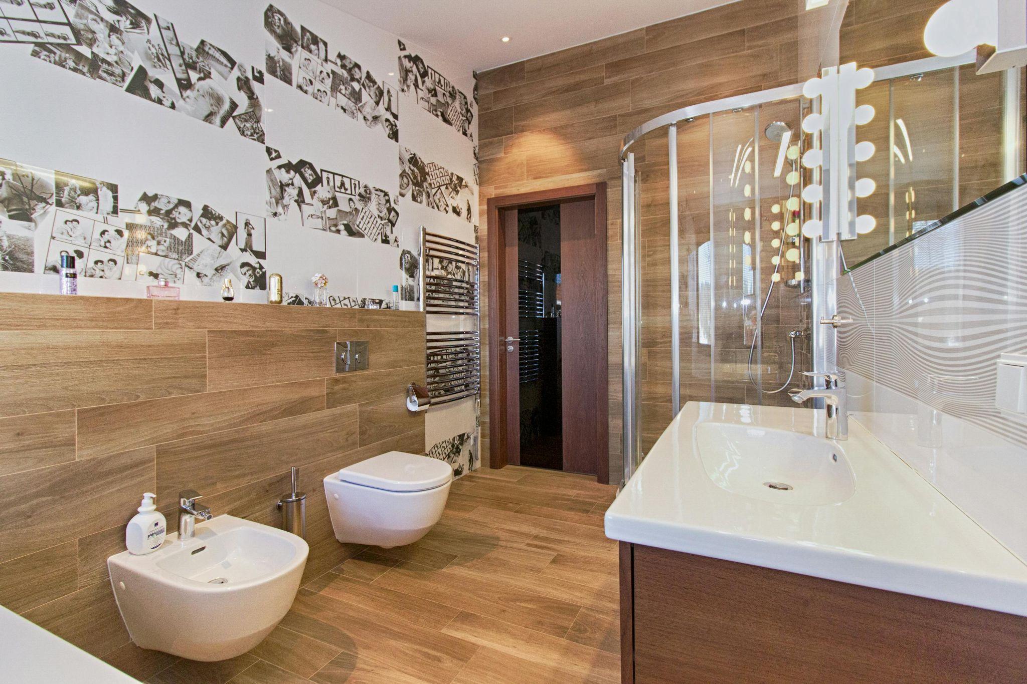 Contemporary bathroom remodel with walk-in shower and wood-look tile